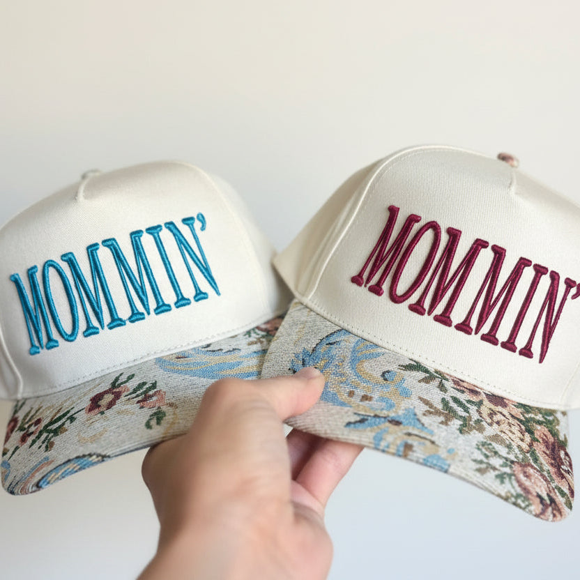 Two white hats with &