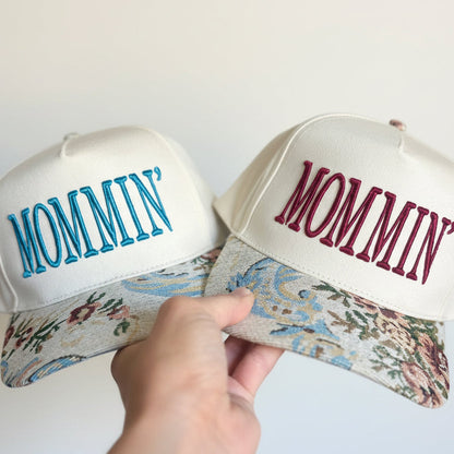 Two white hats with &